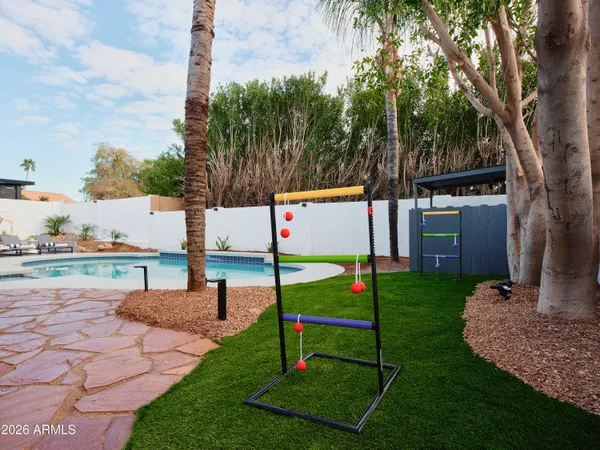 a view of a back yard of the house