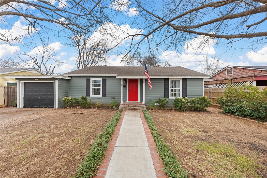 a front view of a house with yard