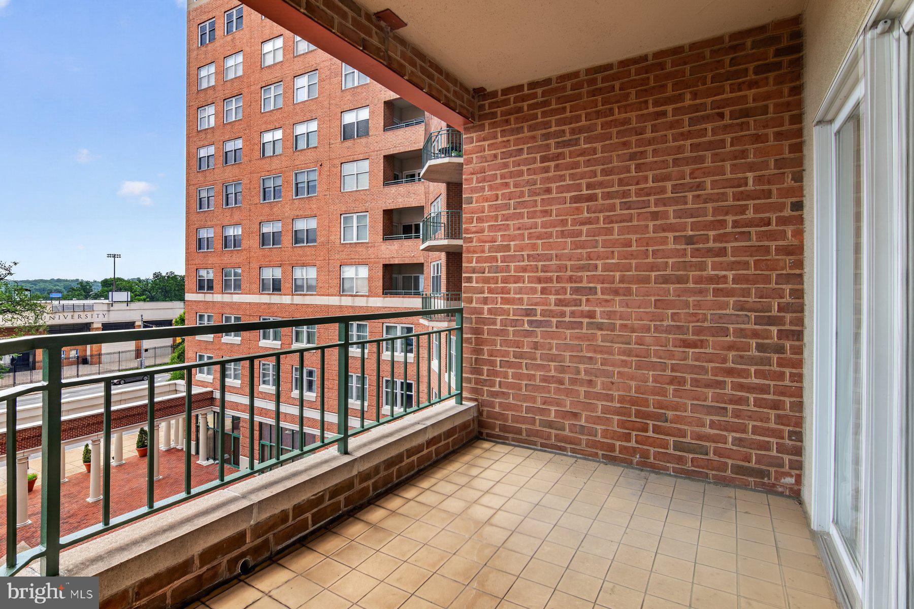 3801 Canterbury Road, Unit 403 Baltimore, MD 21218 - Photo 23 of 25 Spacious balcony with urban views.