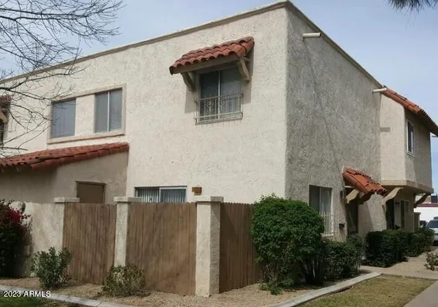 a front view of a house with garage