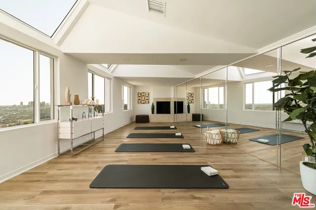 a view of a living room and kitchen view