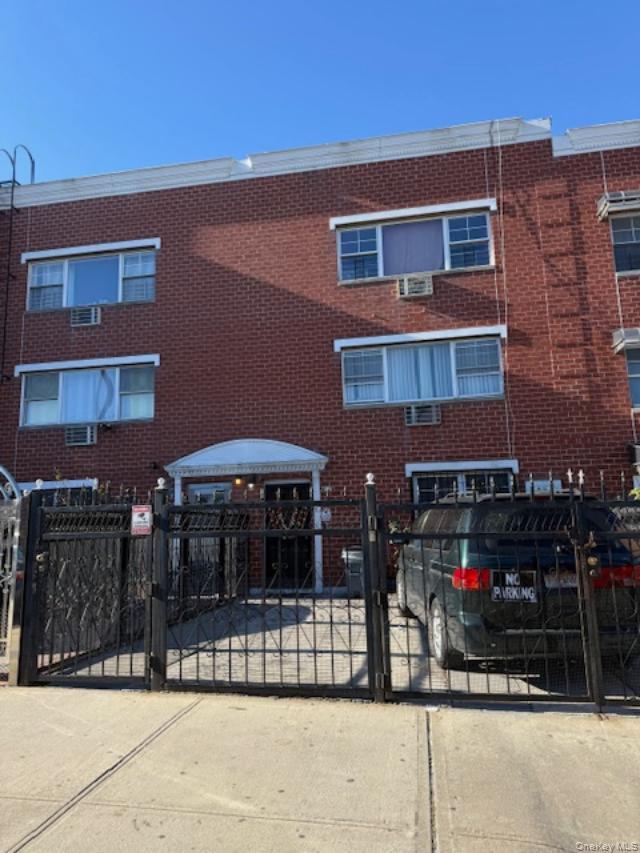 827 Longfellow Avenue Bronx, NY 10474 - Photo 2 of 16 a front view of a building with street