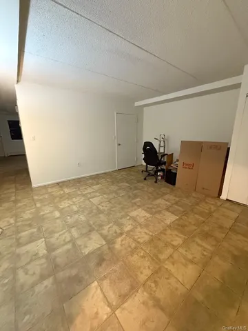 a view of garage with a sink