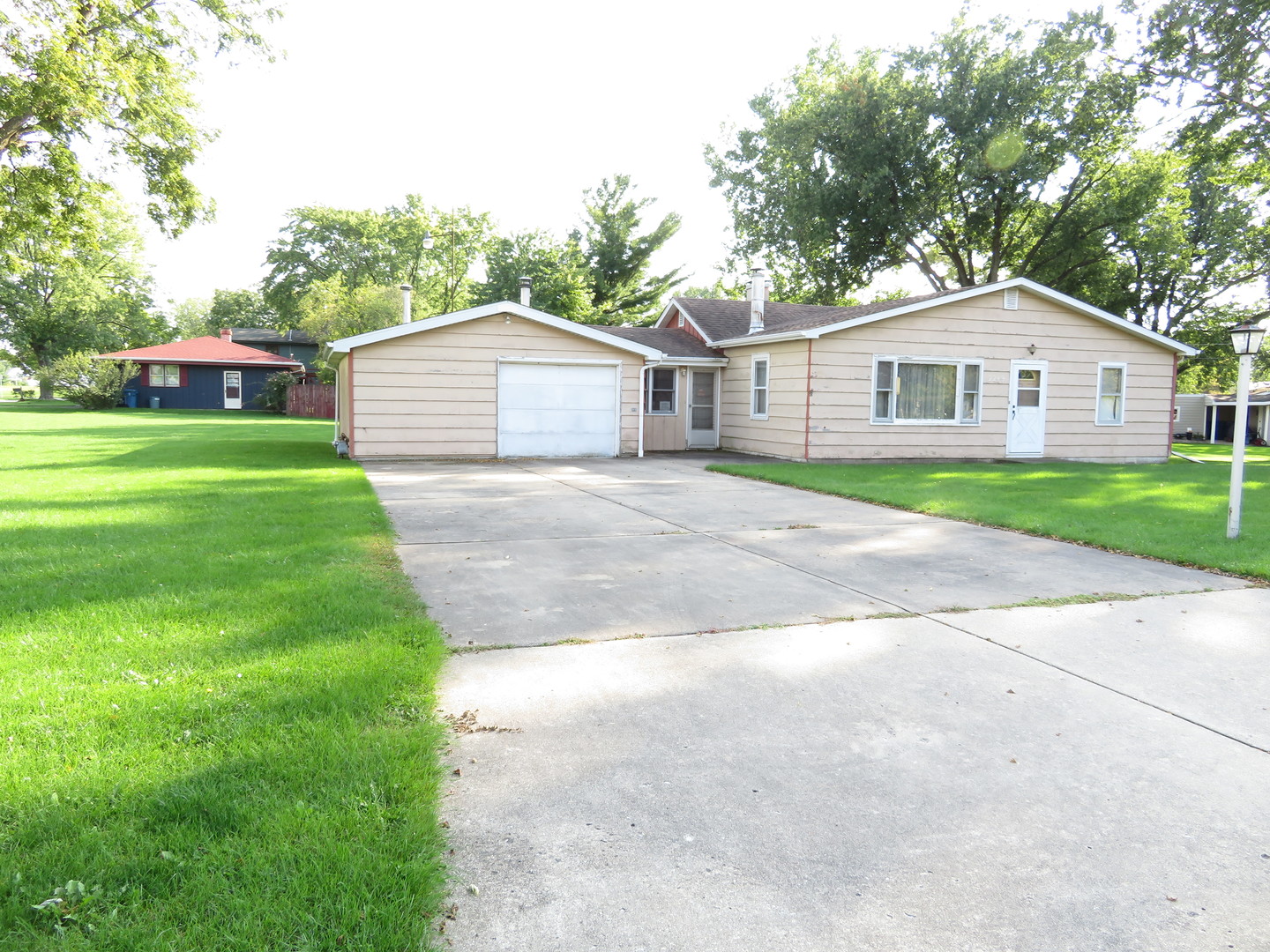 2249 Green Street Crest Hill, IL 60403 - Photo 1 of 10 a front view of a house with a yard and trees