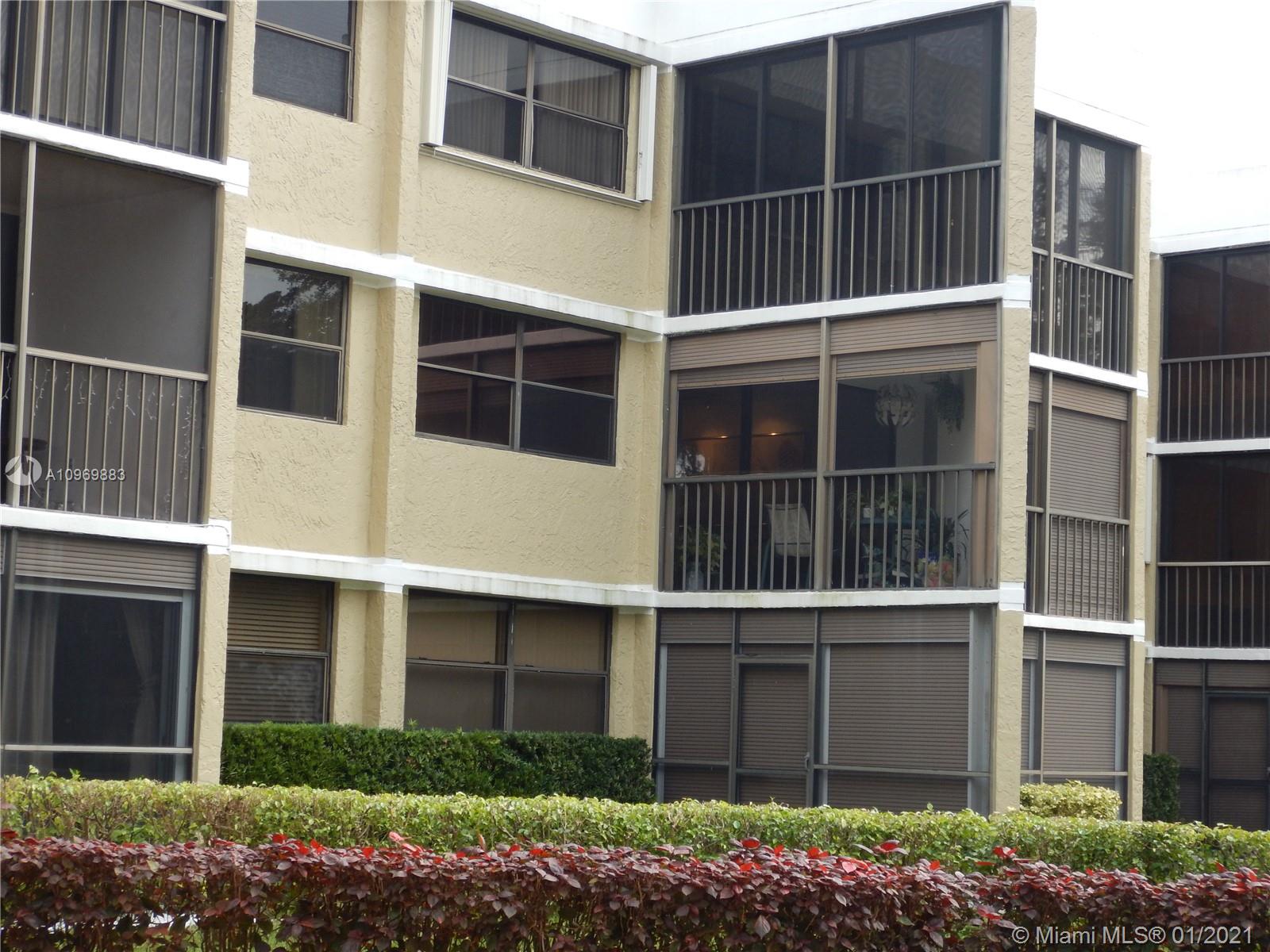 16100 Golf Club Road, Unit 210 Weston, FL 33326 - Photo 15 of 40 a house with a window