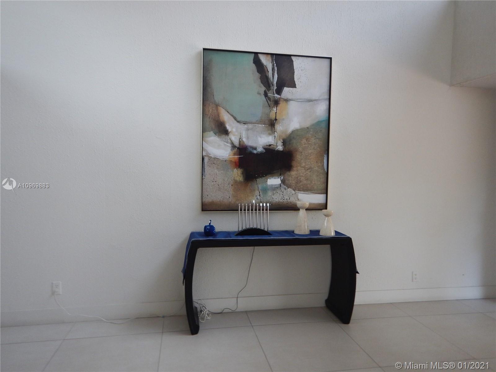 16100 Golf Club Road, Unit 210 Weston, FL 33326 - Photo 17 of 40 a view of cabinets