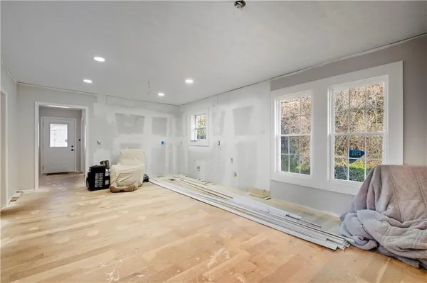 a view of a room that has a window in it