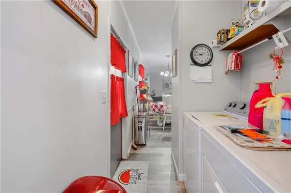 a bathroom with a sink vanity mirror and toilet
