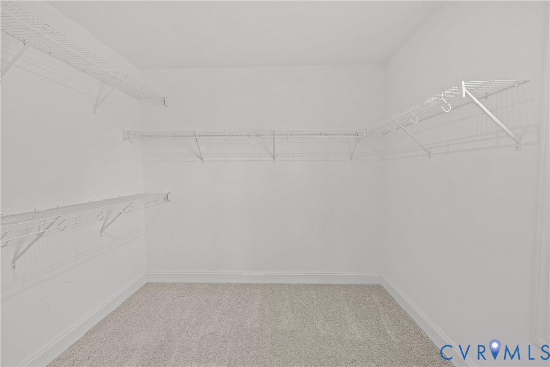 224 Lauradell Road Ashland, VA 23005 - Photo 43 of 74 Spacious walk-in closet featuring light-toned carp