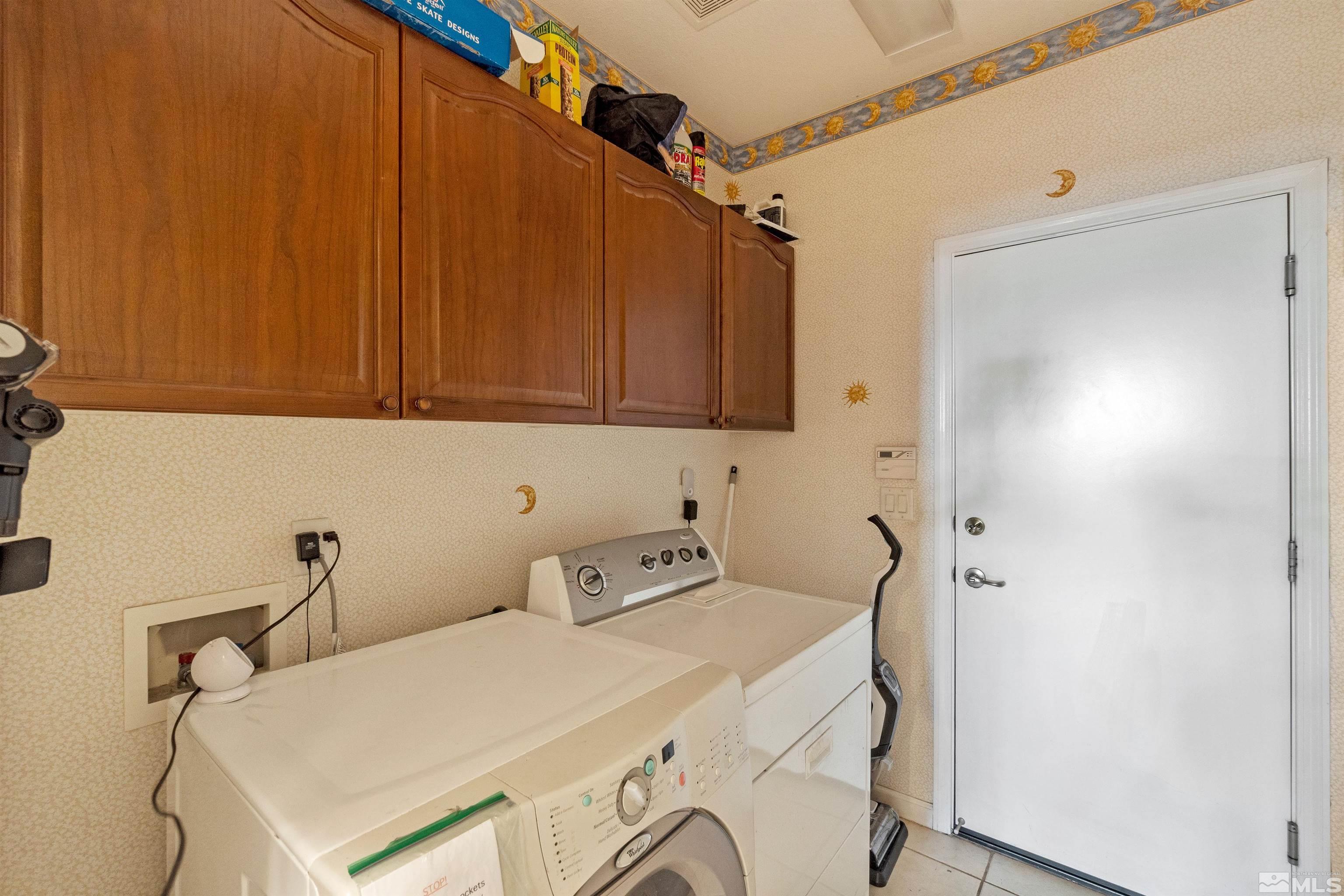 1301 Cranwood Court Reno, NV 89521 - Photo 24 of 34 a utility room with dryer and washer