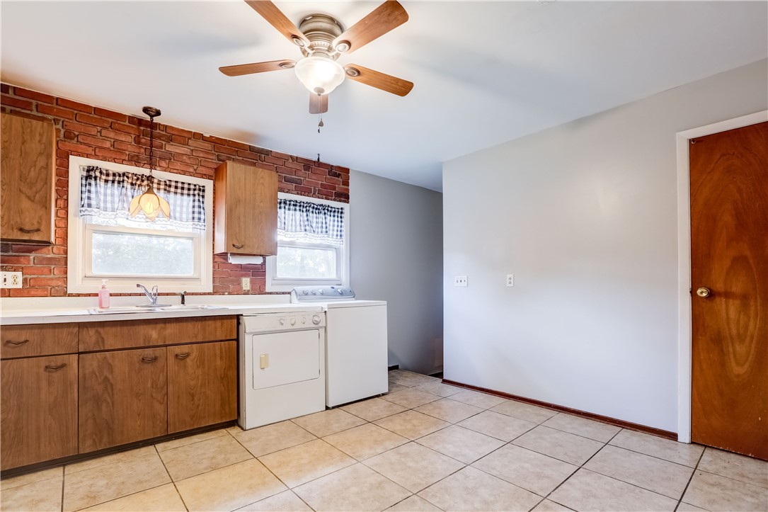 1359 Lehigh Station Road Henrietta, NY 14467 - Photo 7 of 32 Upper kitchen is large eat-in