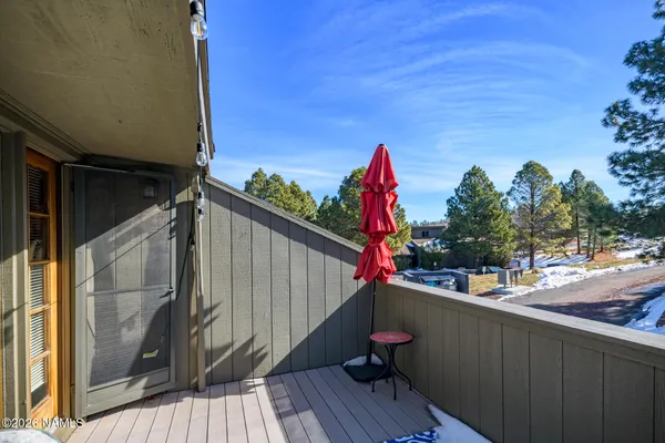 a room with furniture and wooden floor