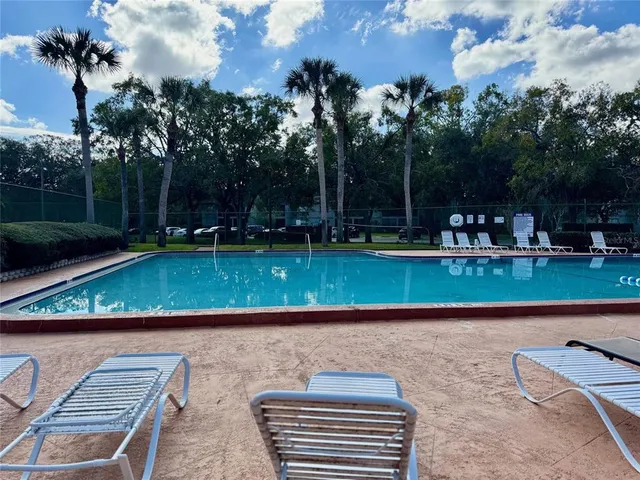 a view of a yard with a sitting area
