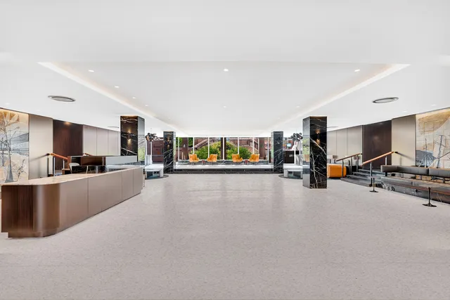 a view of a living room and a flat screen tv