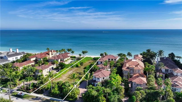 an aerial view of a houses with an outdoor space