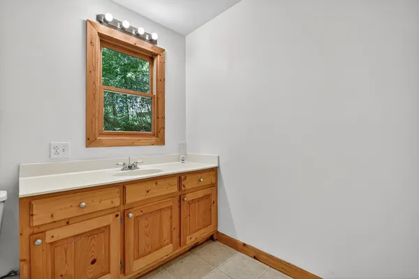 a bathroom with a sink and a vanity