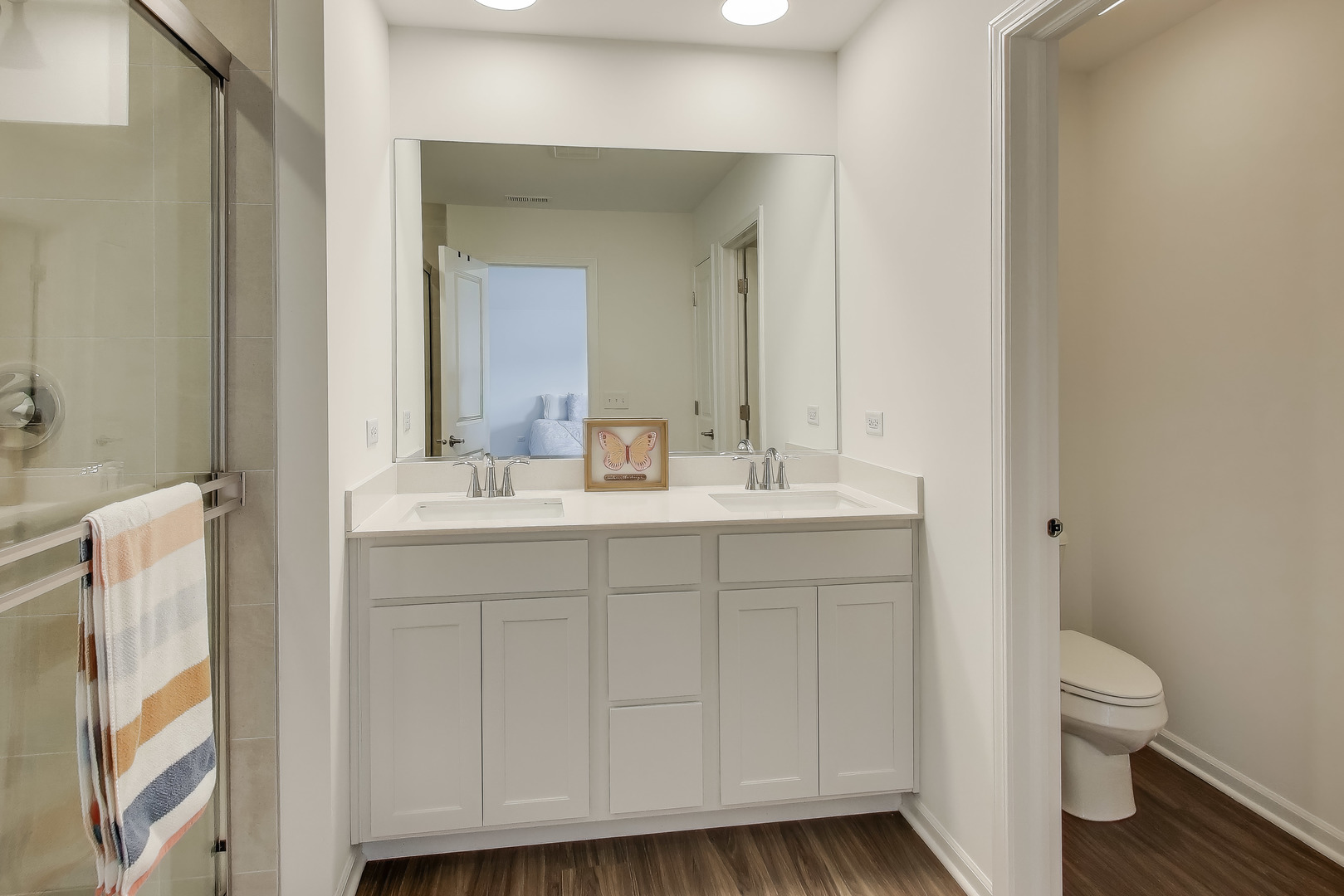 709 Neubauer Circle Lindenhurst, IL 60046 - Photo 13 of 25 a bathroom with a sink mirror vanity and toilet