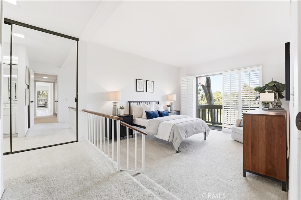 10 Lago Norte Irvine, CA 92612 - Photo 12 of 29 a bed room with a bed and a large window