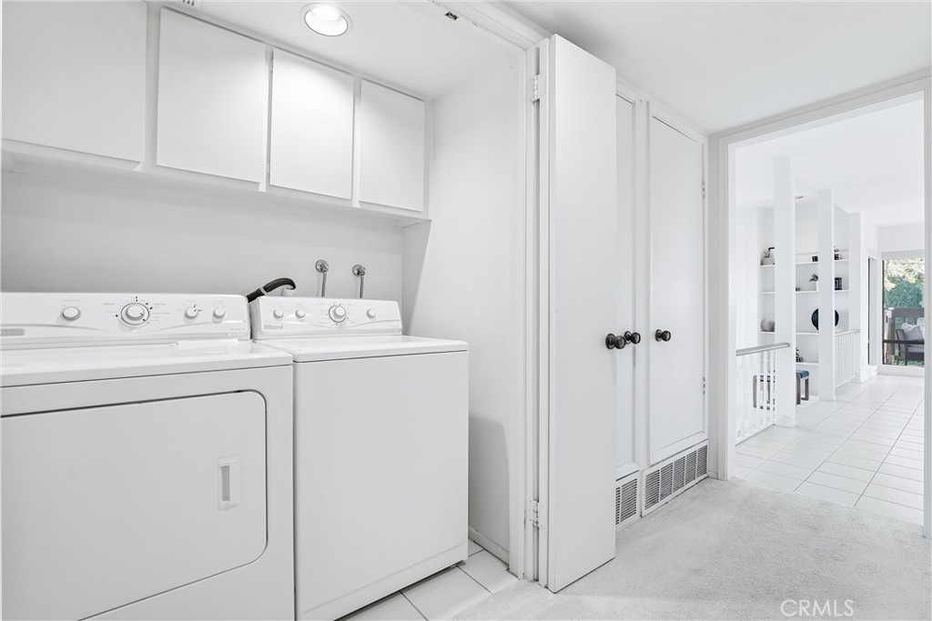 10 Lago Norte Irvine, CA 92612 - Photo 17 of 29 a utility room with dryer and washer