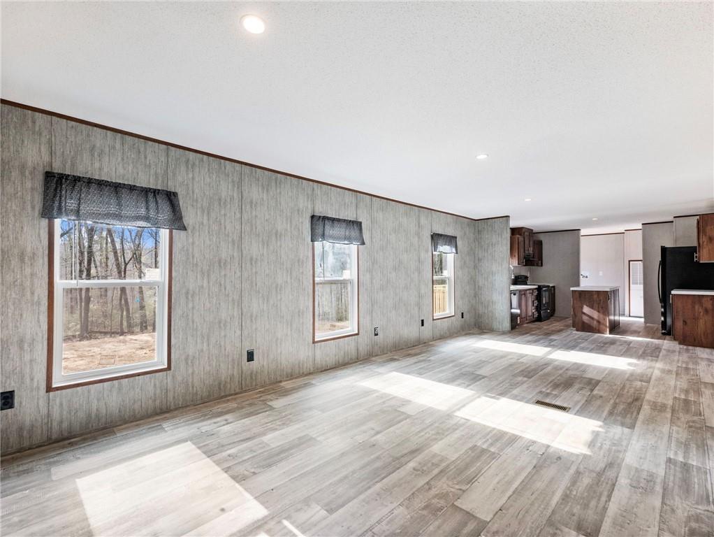 222 Lynn Road Bethlehem, GA 30620 - Photo 13 of 45 a view of livingroom with furniture and windows