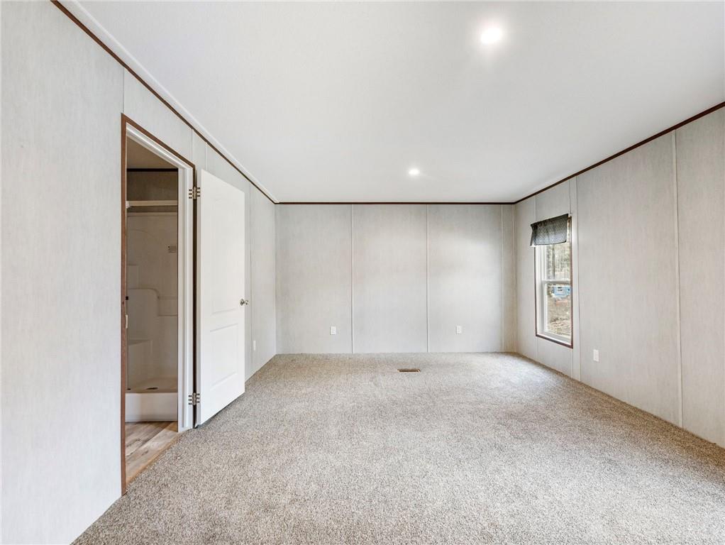 222 Lynn Road Bethlehem, GA 30620 - Photo 14 of 45 an empty room with windows