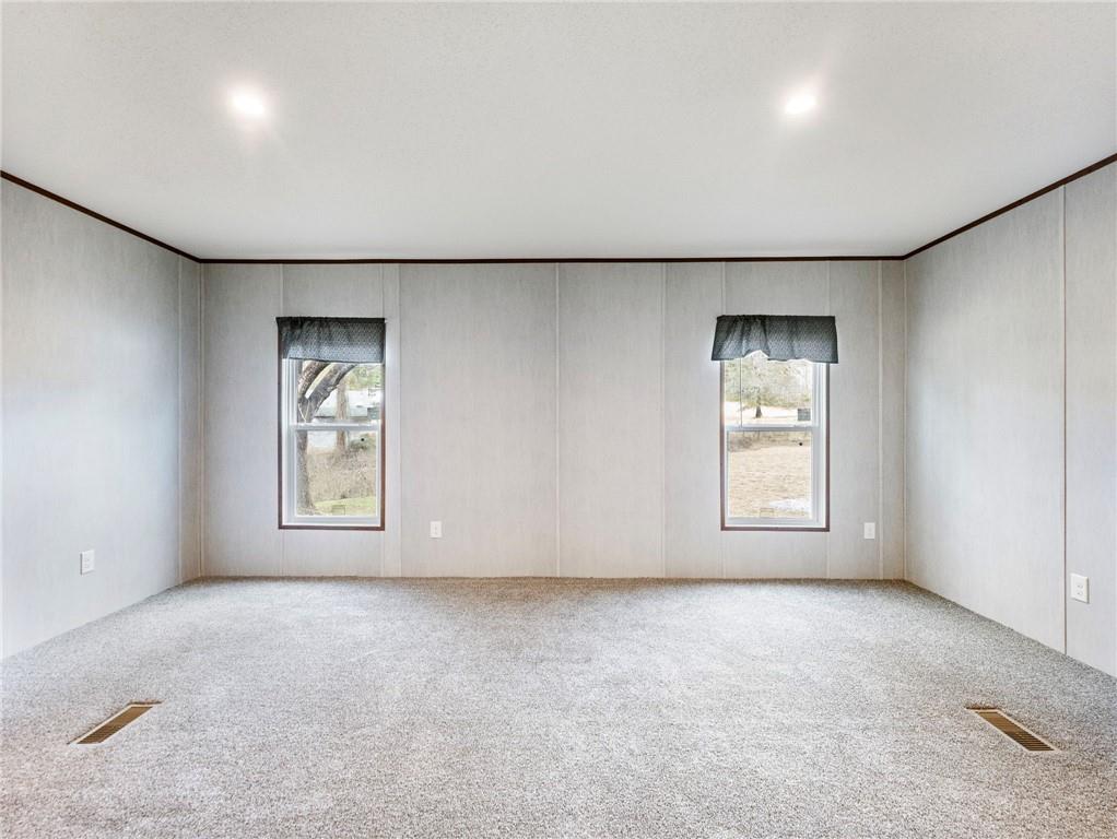 222 Lynn Road Bethlehem, GA 30620 - Photo 16 of 45 an empty room with windows