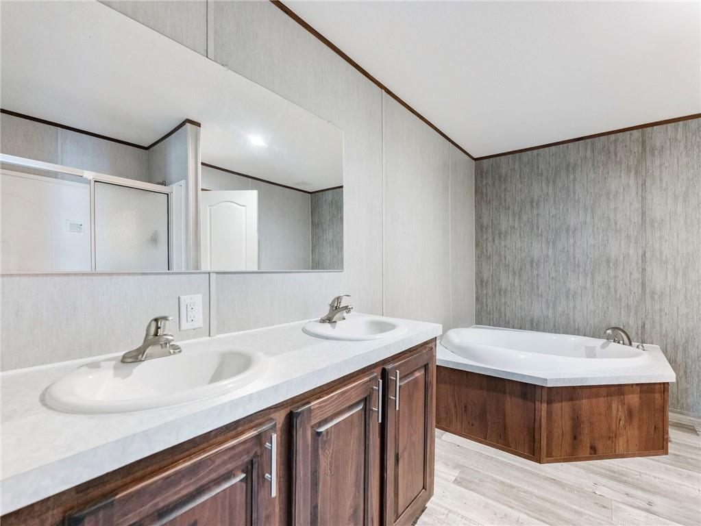 222 Lynn Road Bethlehem, GA 30620 - Photo 17 of 45 a bathroom with a sink and a mirror