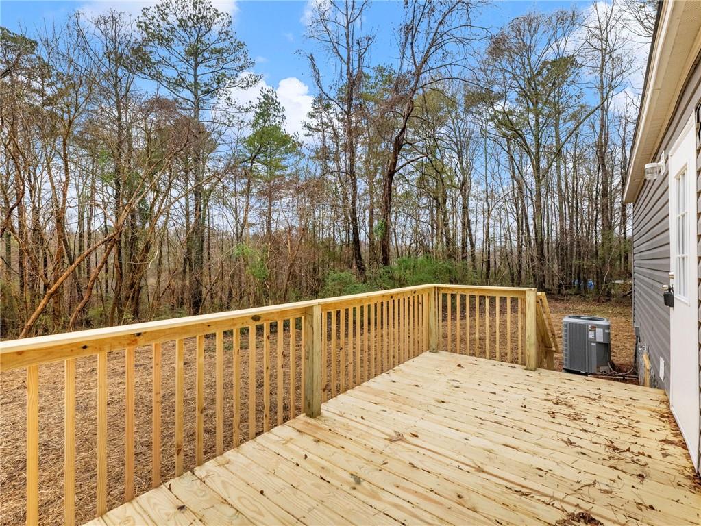 222 Lynn Road Bethlehem, GA 30620 - Photo 37 of 45 a view of wooden deck and a trees