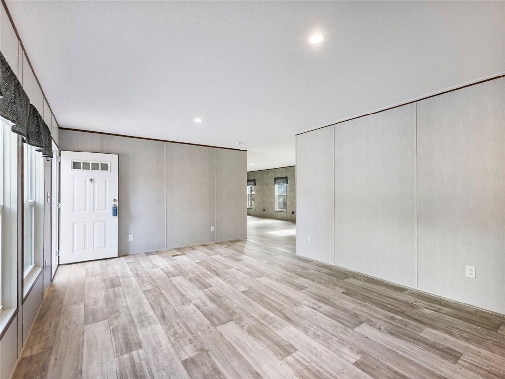222 Lynn Road Bethlehem, GA 30620 - Photo 4 of 45 a view of empty room with wooden floor
