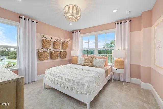 a bathroom with a sink double vanity granite tub shower and a mirror
