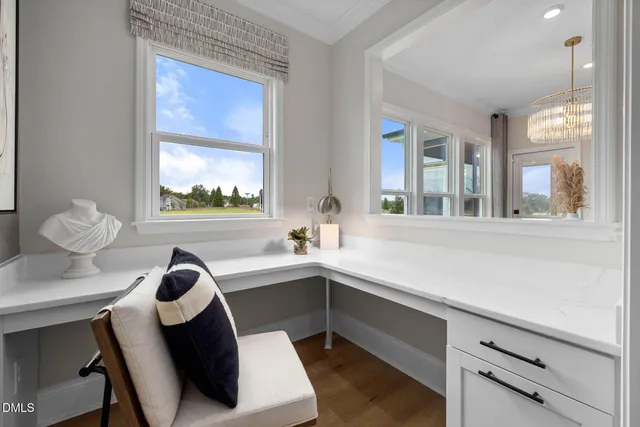 a bathroom with a sink a toilet a shower and a mirror