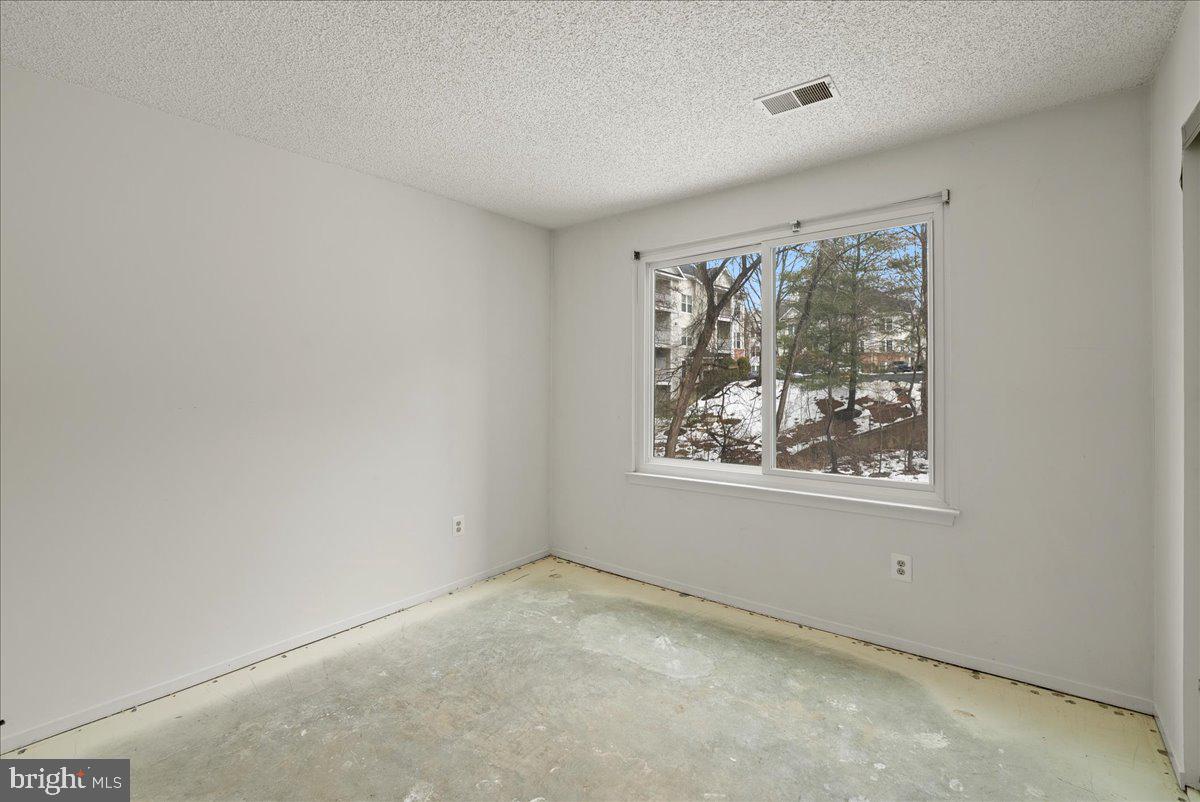 11719 Summerchase Circle Reston, VA 20194 - Photo 13 of 25 an empty room with windows