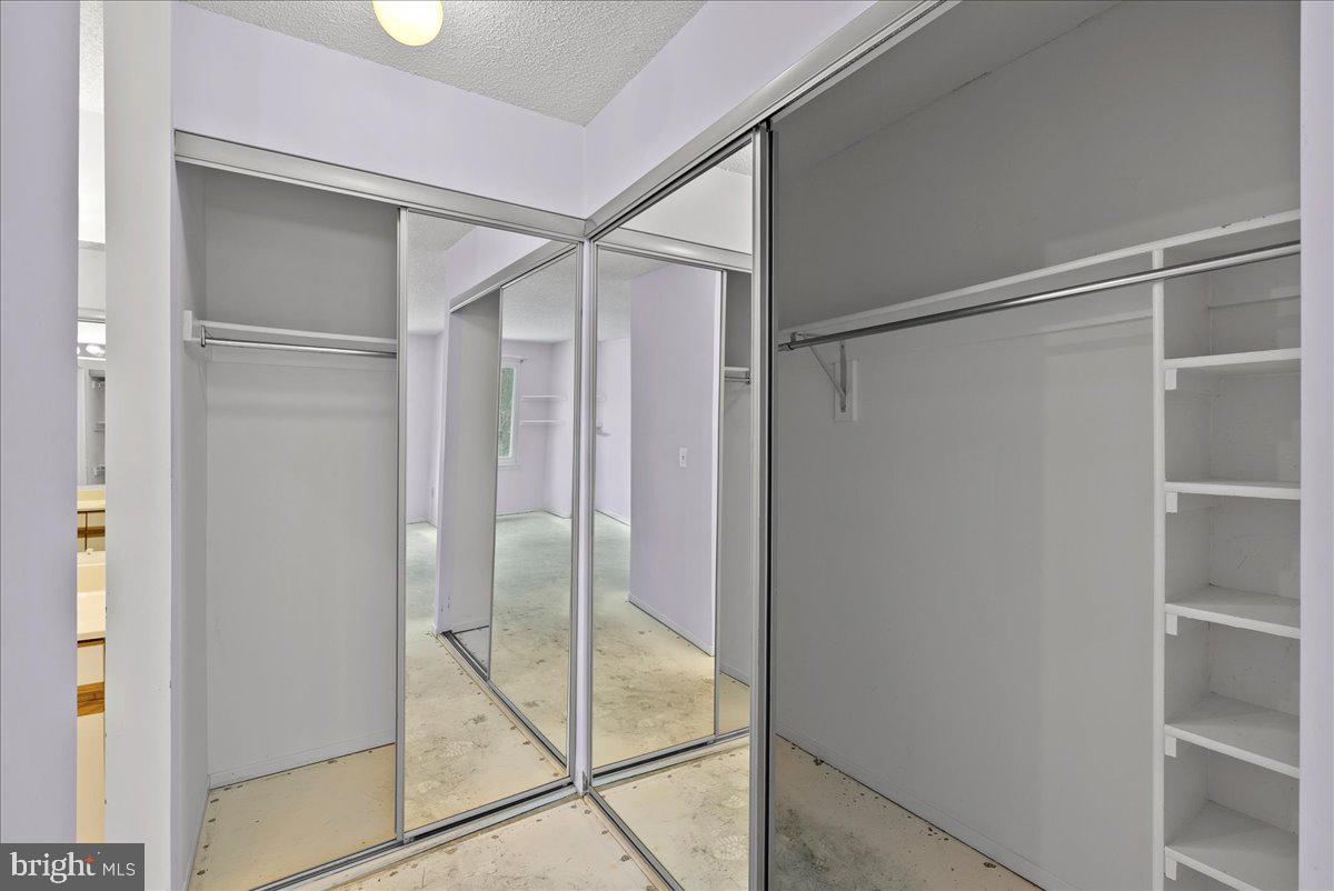 11719 Summerchase Circle Reston, VA 20194 - Photo 19 of 25 a bathroom with a glass shower door