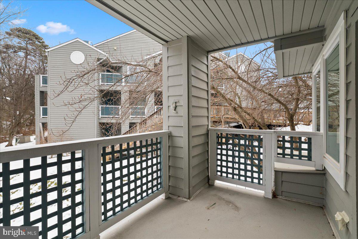 11719 Summerchase Circle Reston, VA 20194 - Photo 22 of 25 a view of a balcony with wooden fence