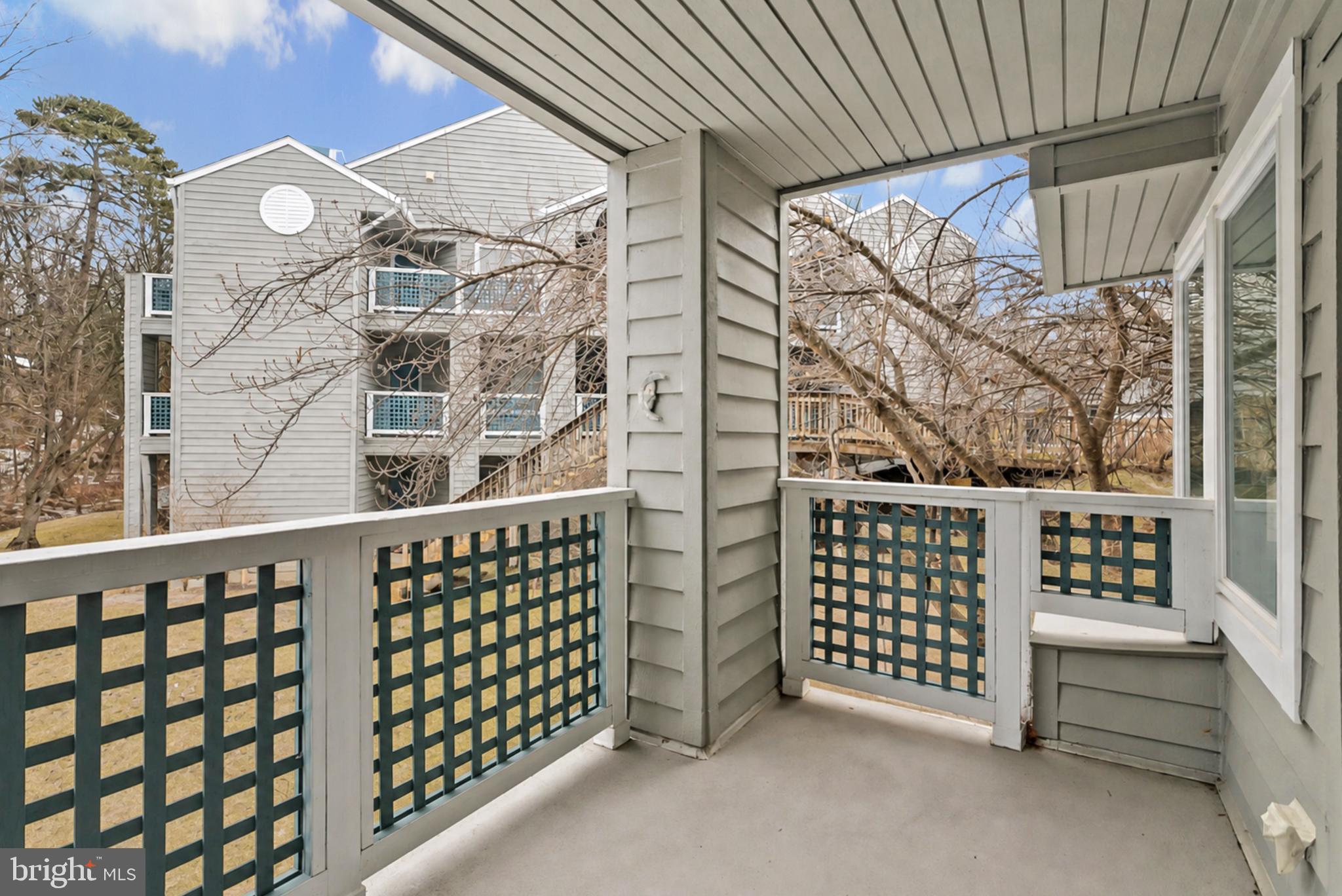 11719 Summerchase Circle Reston, VA 20194 - Photo 22 of 24 a view of a balcony with wooden fence