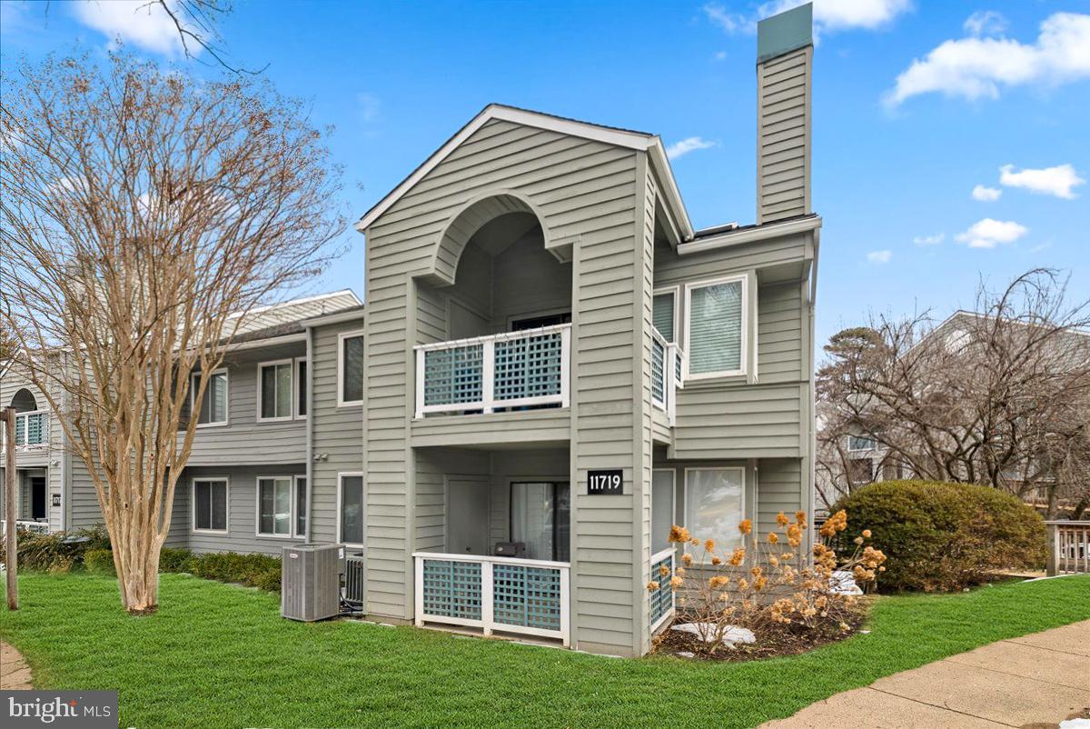 11719 Summerchase Circle Reston, VA 20194 - Photo 25 of 25 a front view of a house with a yard