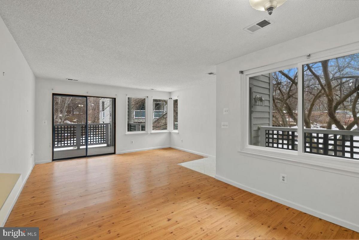 11719 Summerchase Circle Reston, VA 20194 - Photo 9 of 25 a view of an empty room with a window