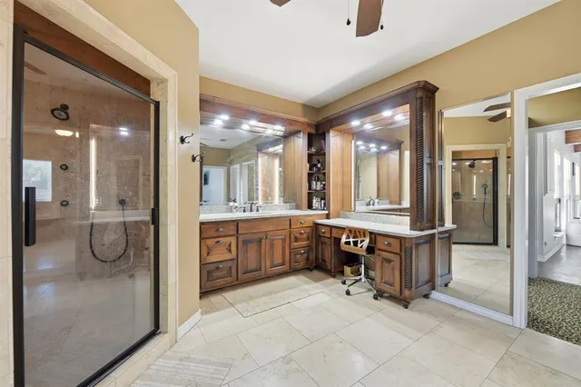 a bed room with a bed and a chandelier