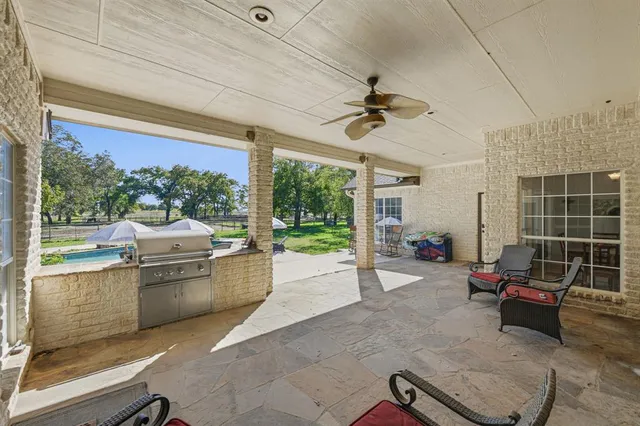 a view of a house with basketball court