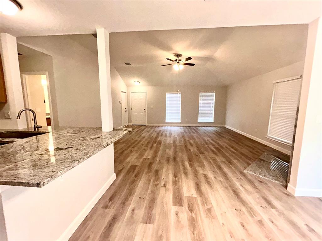 415 Rifleman Trail Arlington, TX 76002 - Photo 13 of 22 View of the living, kitchen and dining rooms.