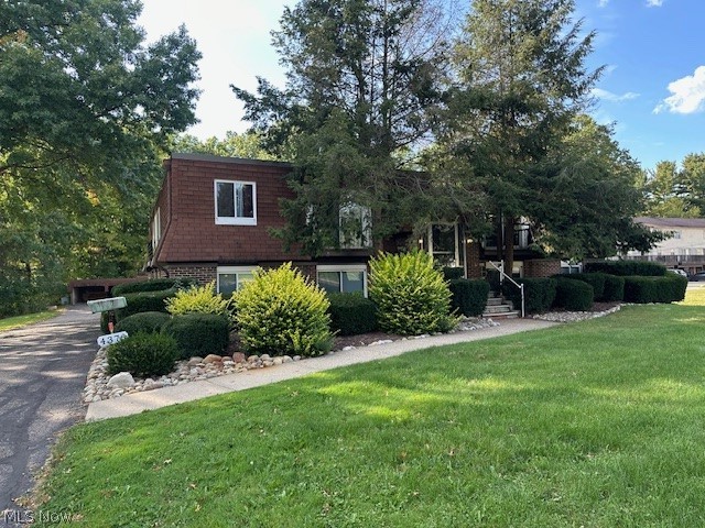 4376 Darrow Road, Unit 7 Stow, OH 44224 - Photo 1 of 23 View of front of property featuring a front lawn