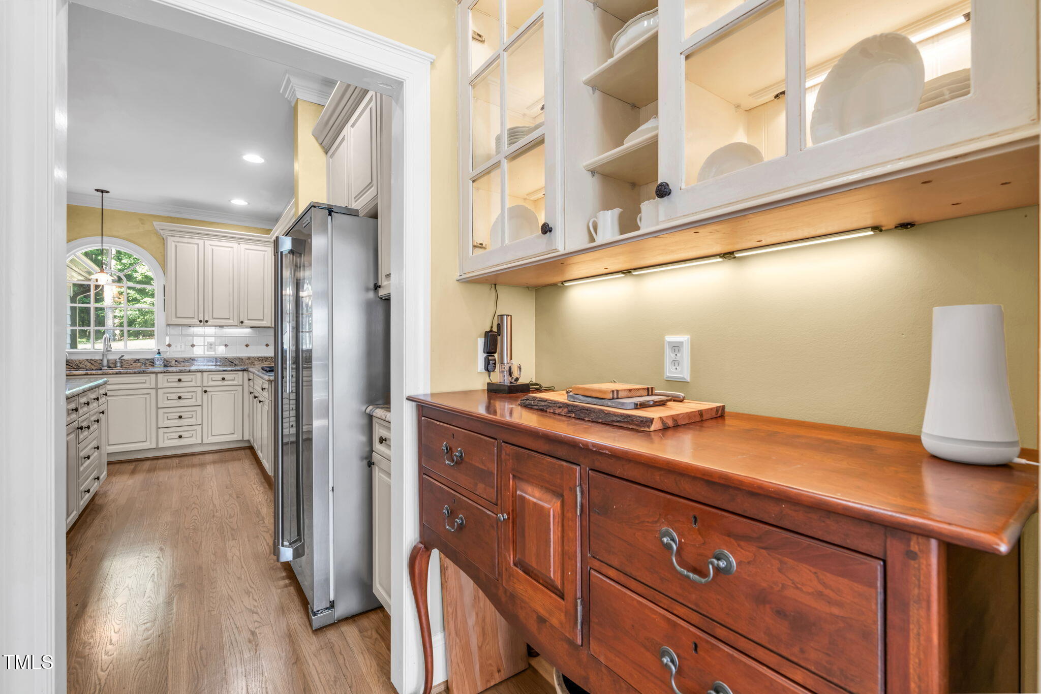 9009 Hometown Drive Raleigh, NC 27615 - Photo 14 of 82 a kitchen with stainless steel appliances granite countertop a refrigerator and a stove