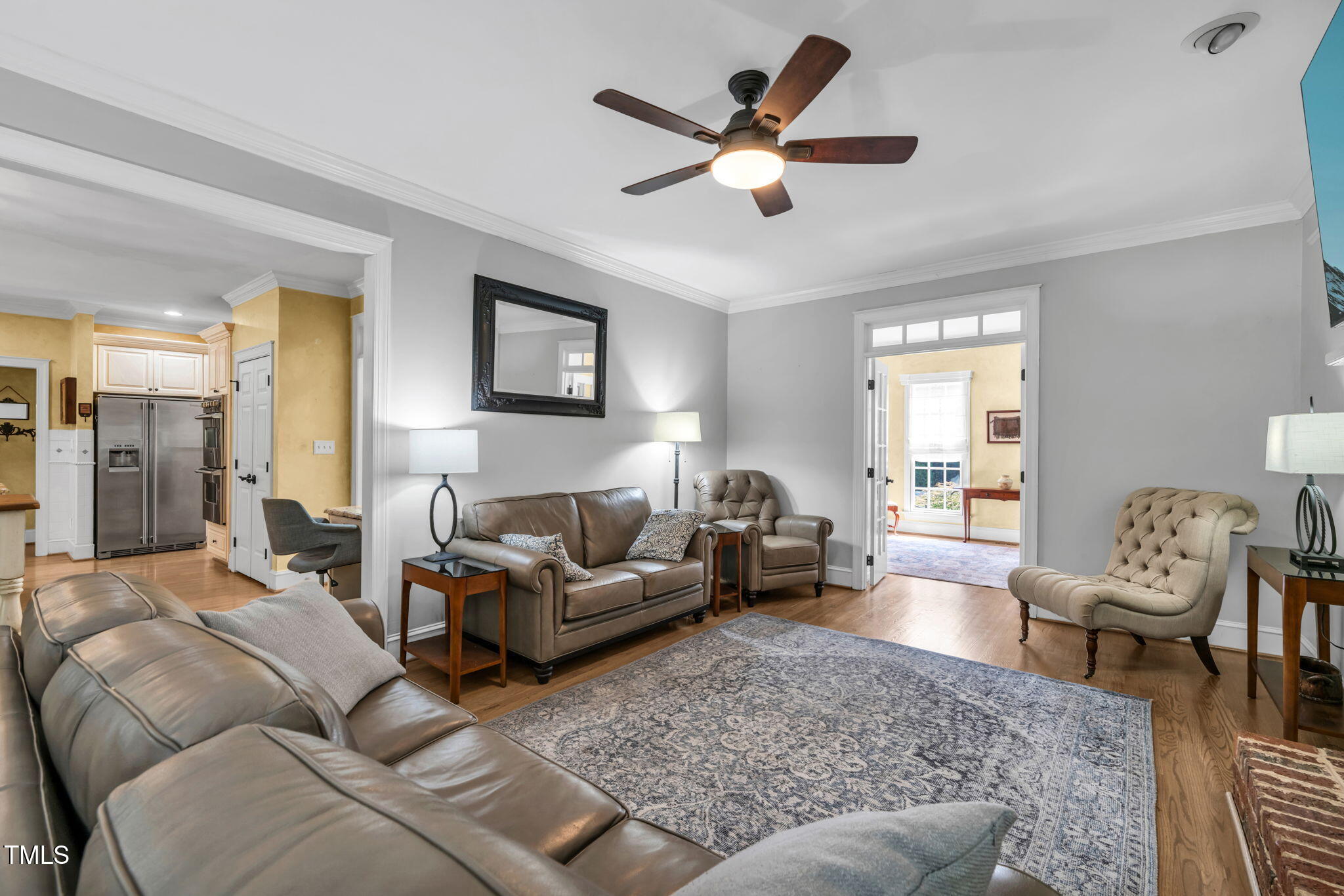 9009 Hometown Drive Raleigh, NC 27615 - Photo 21 of 82 a living room with furniture a couch and wooden floor