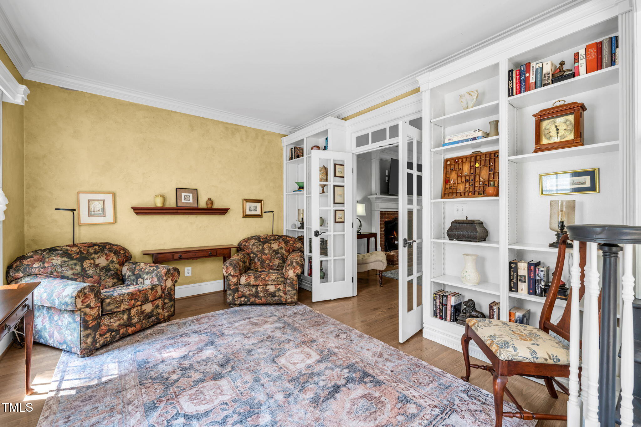9009 Hometown Drive Raleigh, NC 27615 - Photo 24 of 82 a bedroom with furniture and a large window