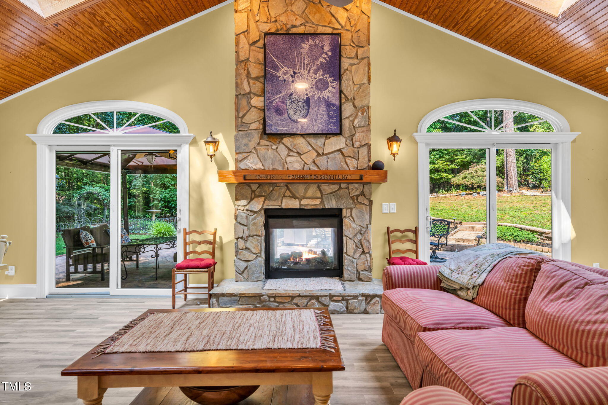 9009 Hometown Drive Raleigh, NC 27615 - Photo 28 of 82 a living room with furniture and a fireplace