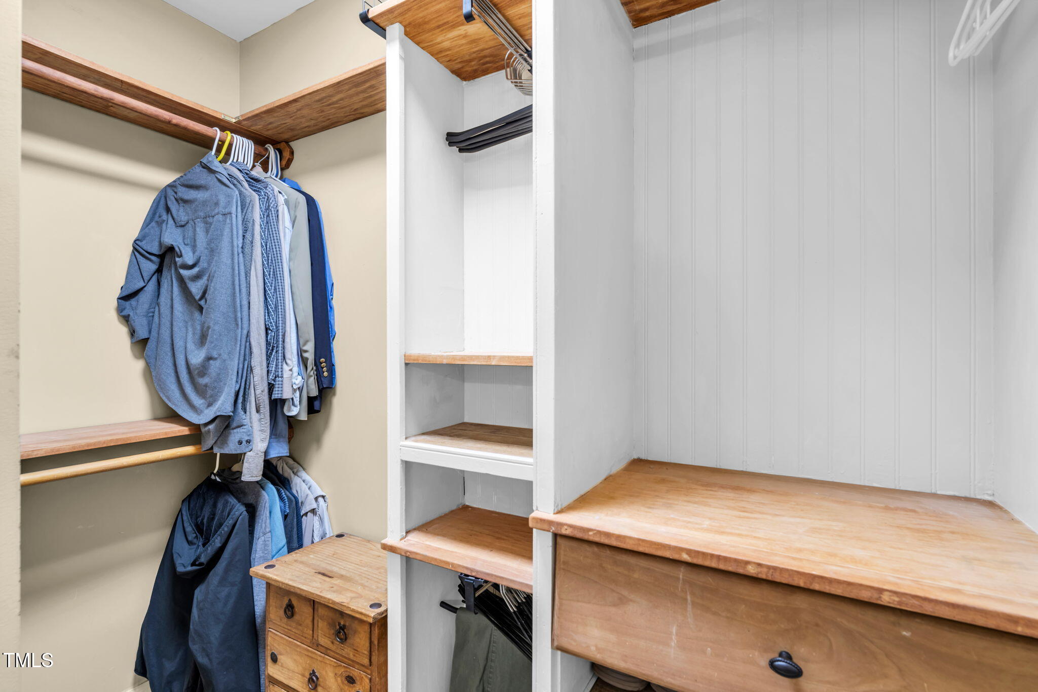 9009 Hometown Drive Raleigh, NC 27615 - Photo 37 of 82 a view of walk in closet with clothes and shoes