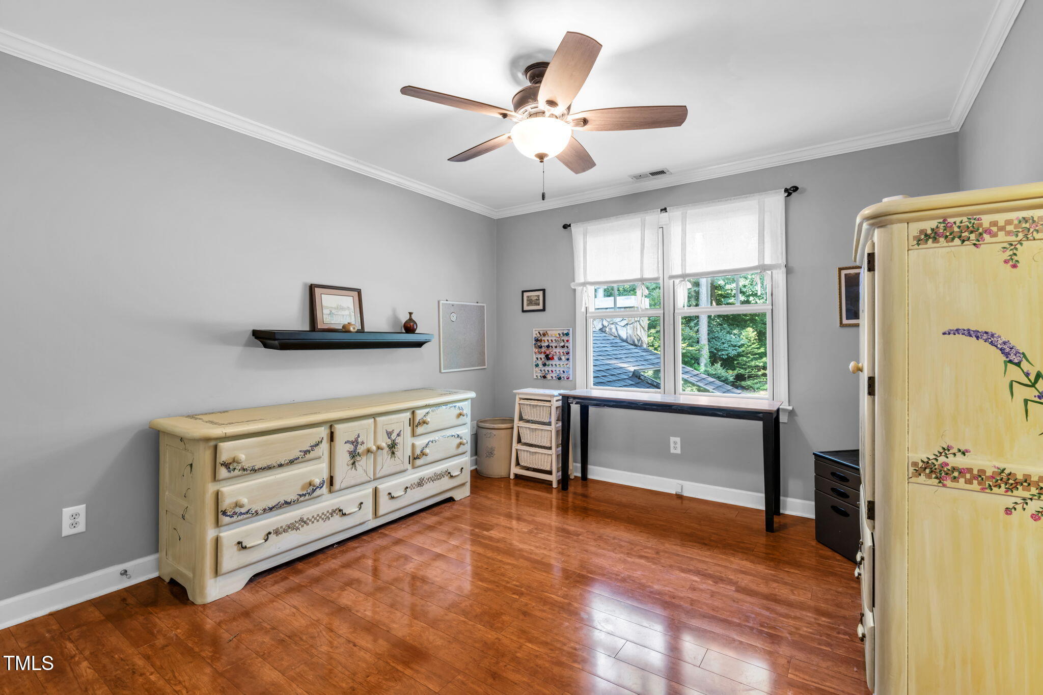 9009 Hometown Drive Raleigh, NC 27615 - Photo 43 of 82 a living room with furniture and a window