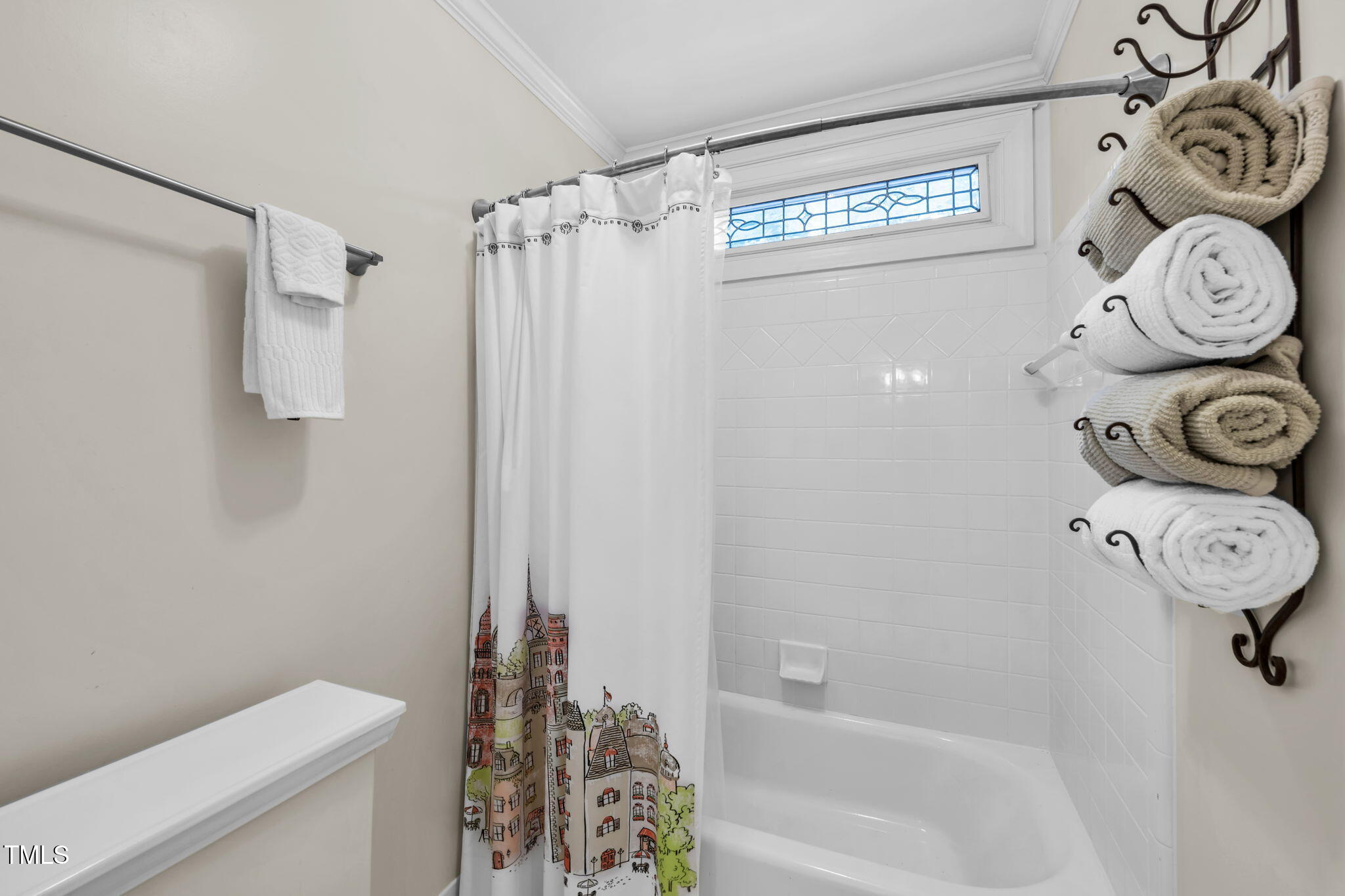 9009 Hometown Drive Raleigh, NC 27615 - Photo 46 of 82 a bathroom with a toilet and a shower