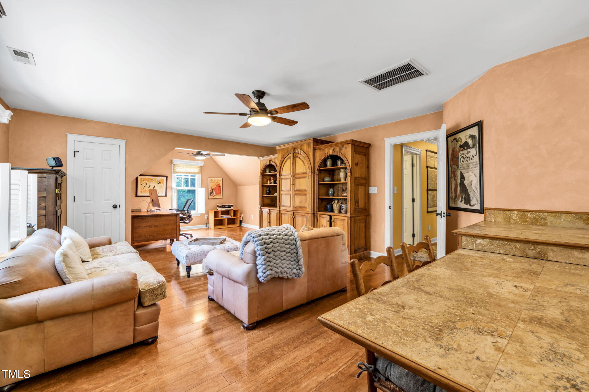9009 Hometown Drive Raleigh, NC 27615 - Photo 47 of 82 a living room with furniture and large windows