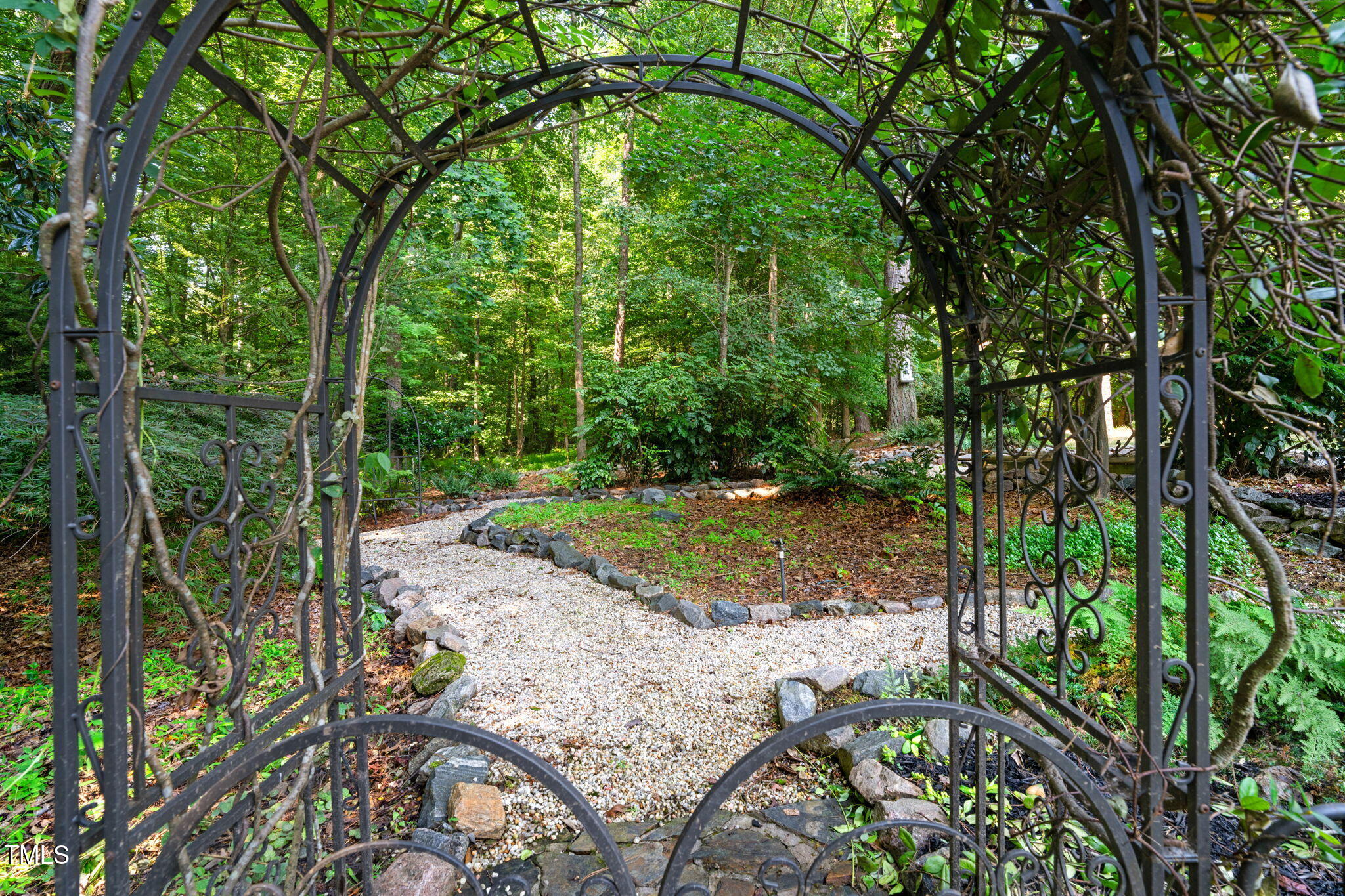 9009 Hometown Drive Raleigh, NC 27615 - Photo 61 of 82 a view of an outdoor space with a lake view